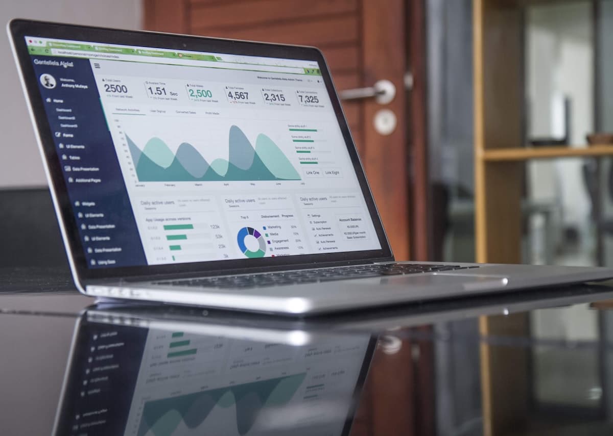 Person analyzing social media data on a laptop